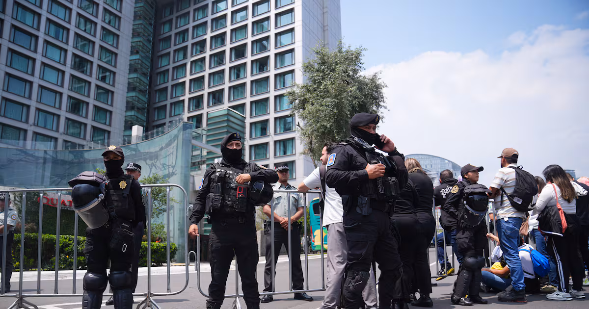 Riot Police Guard England Hotel in Mexico
