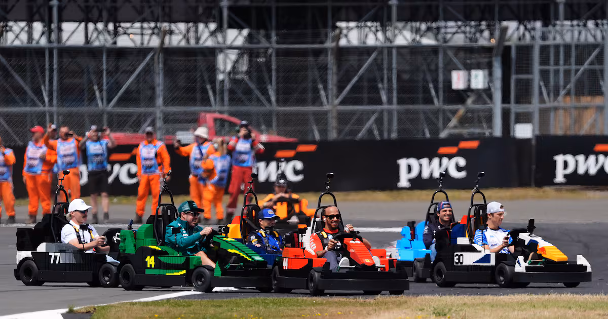 Hamilton Participates in LEGO Race at British GP