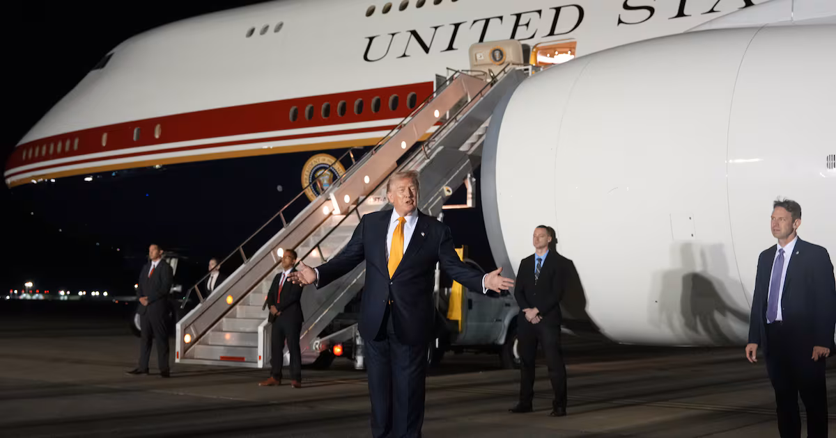 Trump denies security fears over plane change in UK