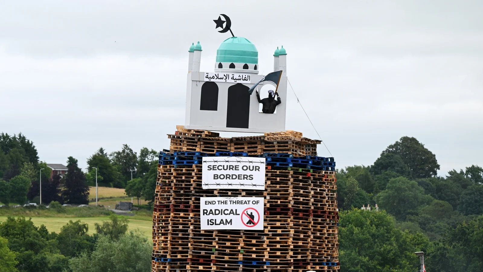 Loyalist Bonfire Lit Early Amid Controversy