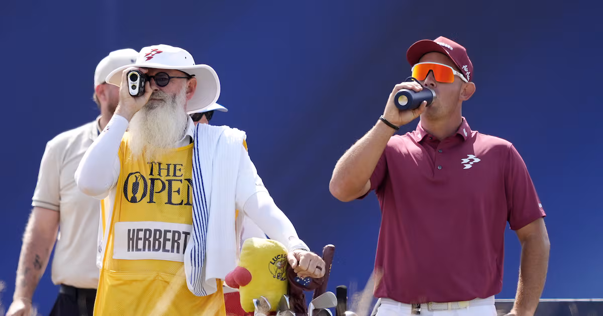Lucas Herbert's Caddie Uses Rangefinder at The Open