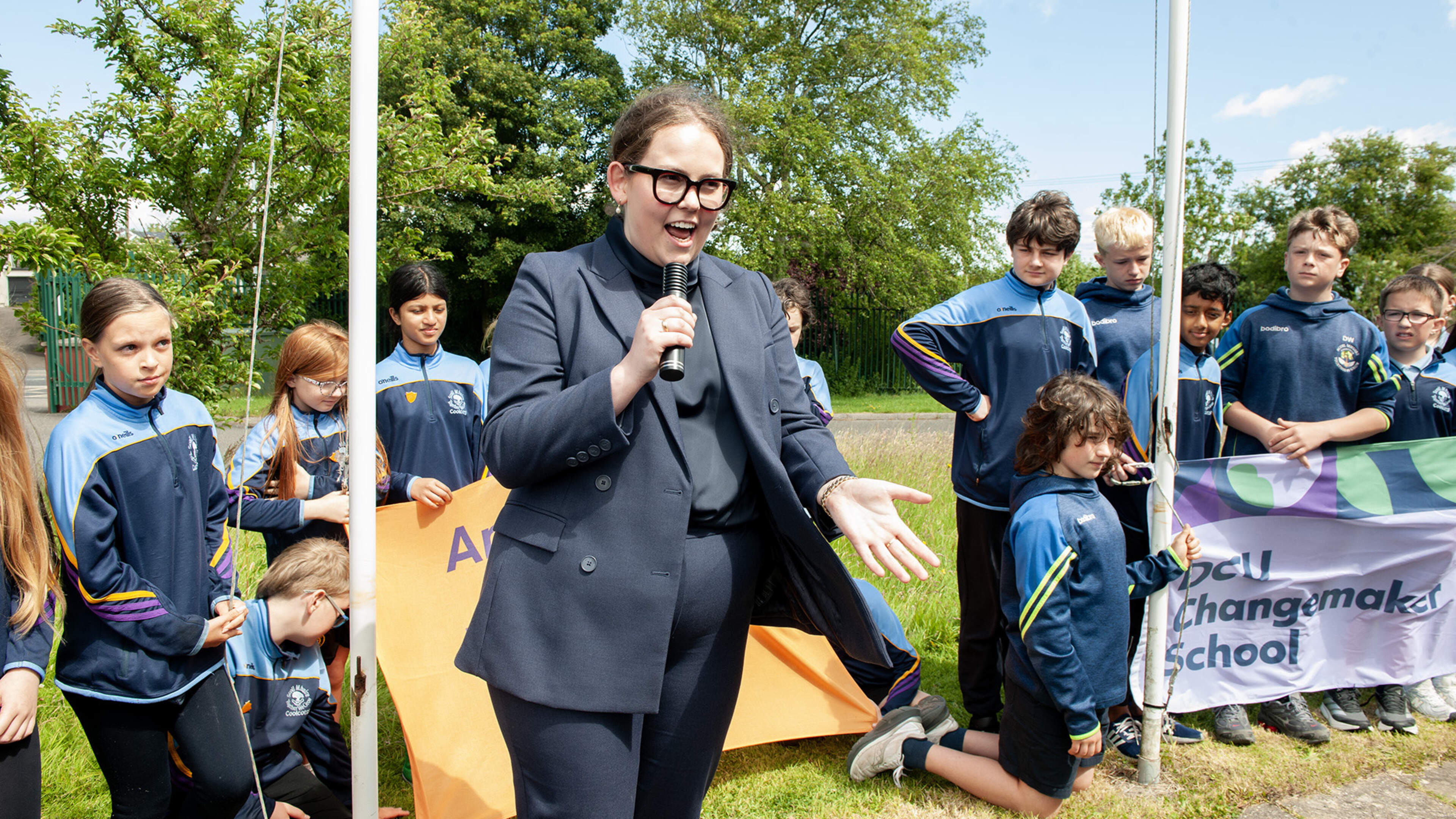 Scoil Mhuire Raises Amber and DCU Flags
