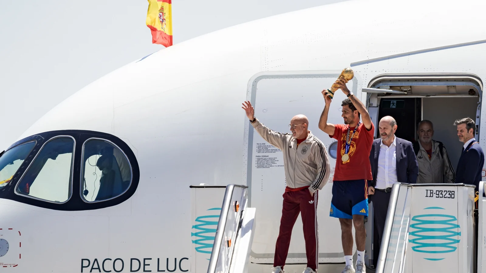Spain's World Cup champions return home