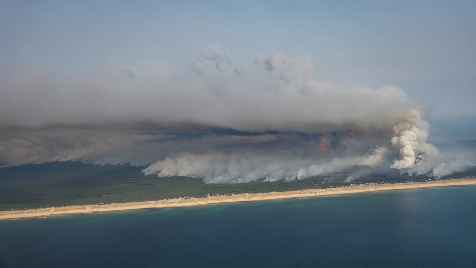 Tens of thousands evacuated as fires rage in Europe