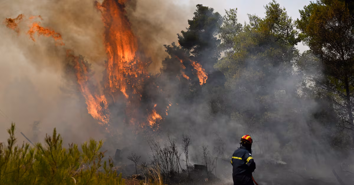 Helicopters Collide Battling Wildfire in Greece
