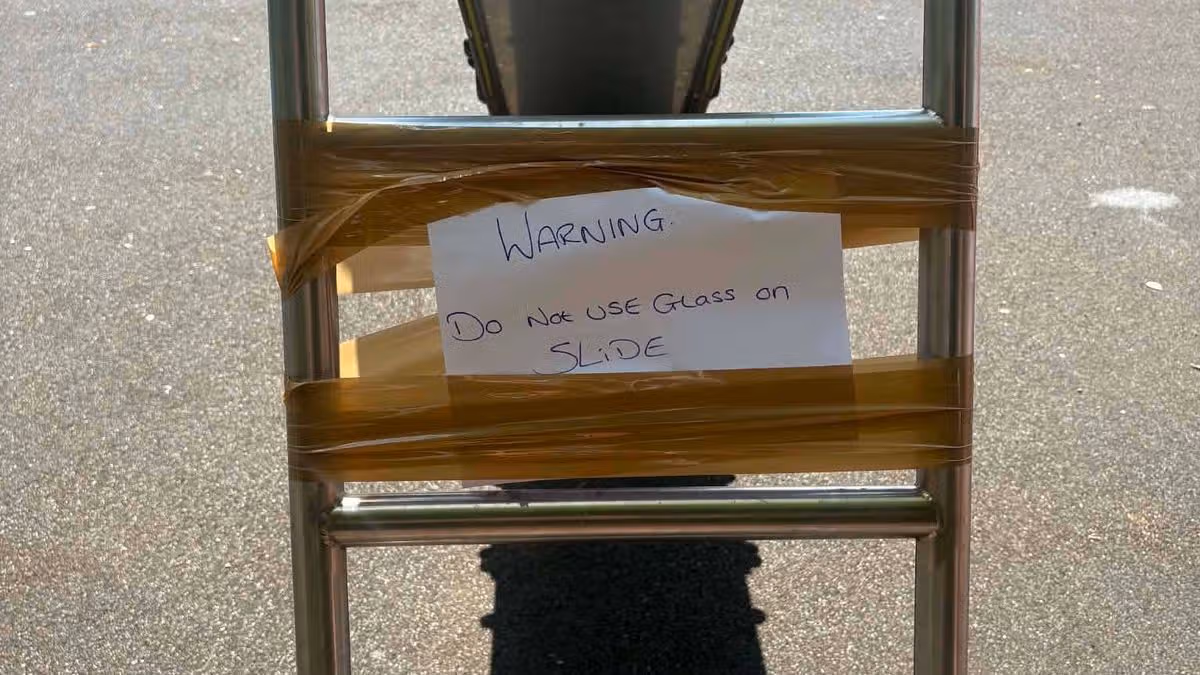 Child injured by glass on playground slide