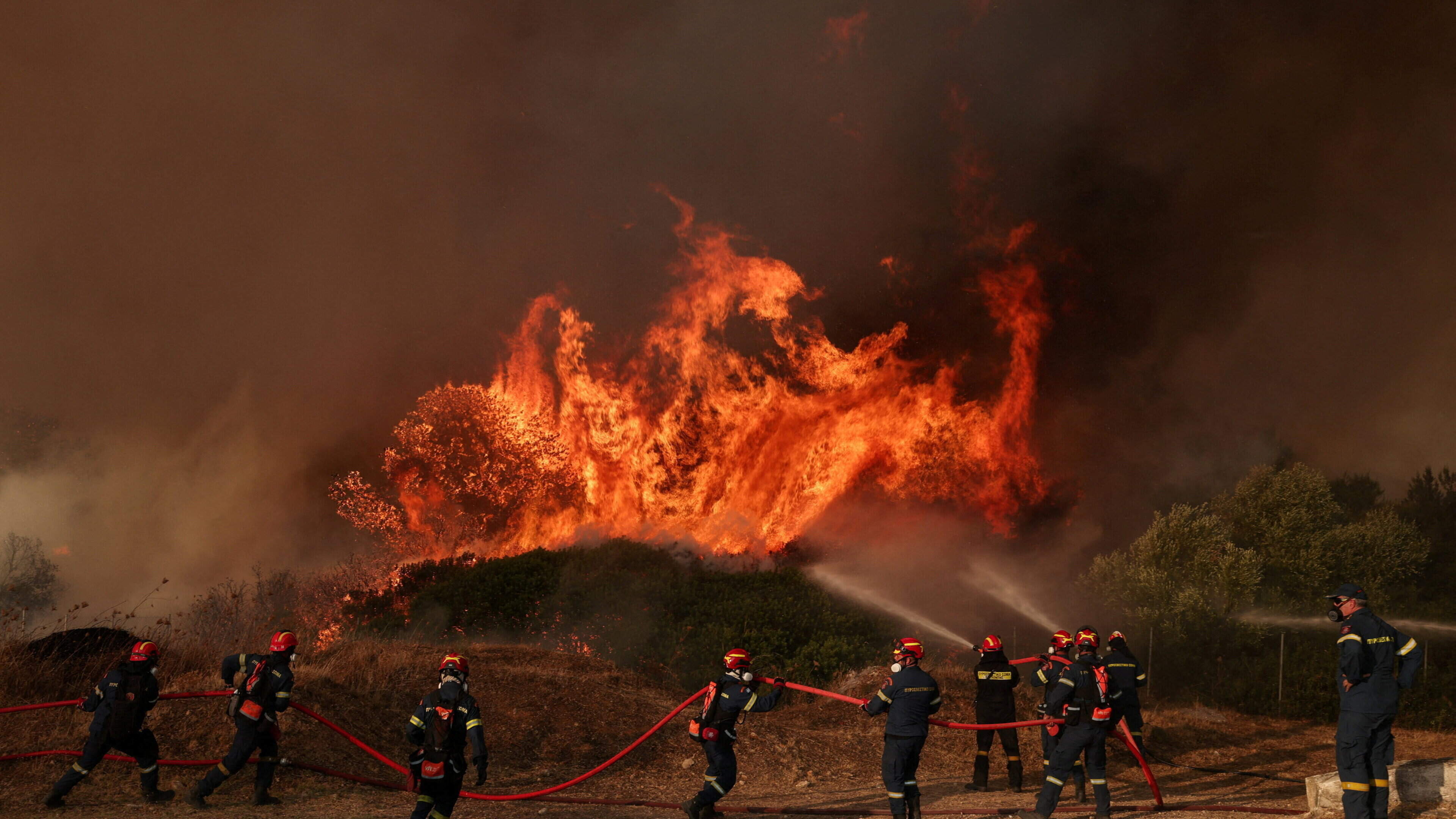 Firefighters Struggle with Wildfire Near Athens