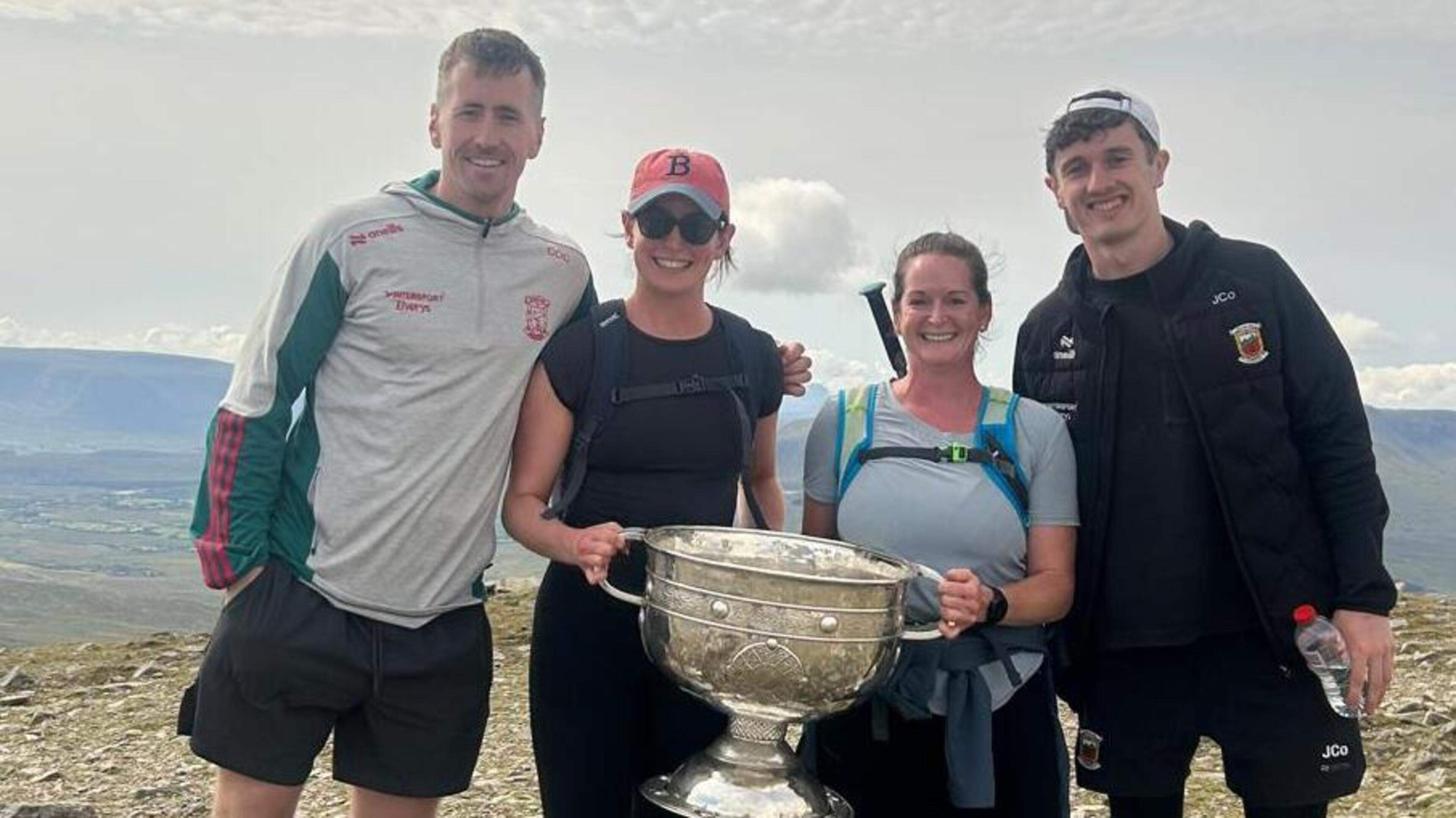 Mayo Sisters Meet Sam Maguire on Croagh Patrick