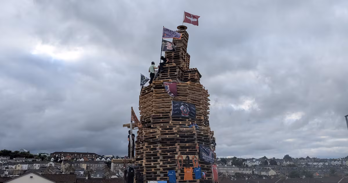 Teenagers Build Bonfire in Derry's Bogside Area