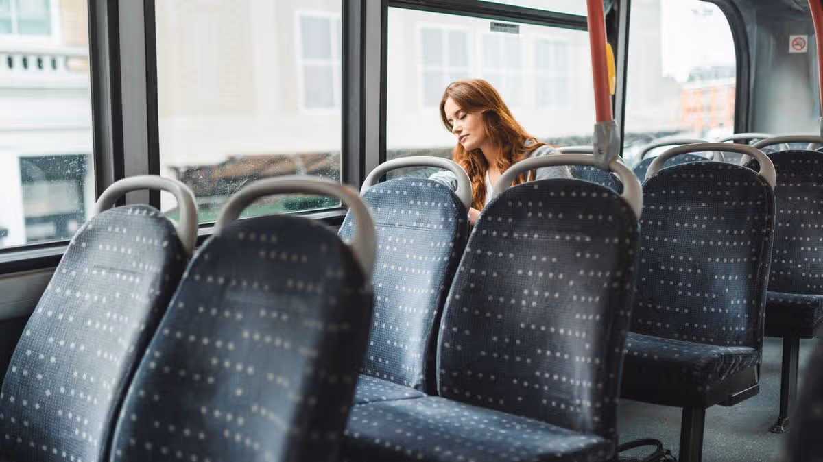 Man Abuses Woman on Empty Bus