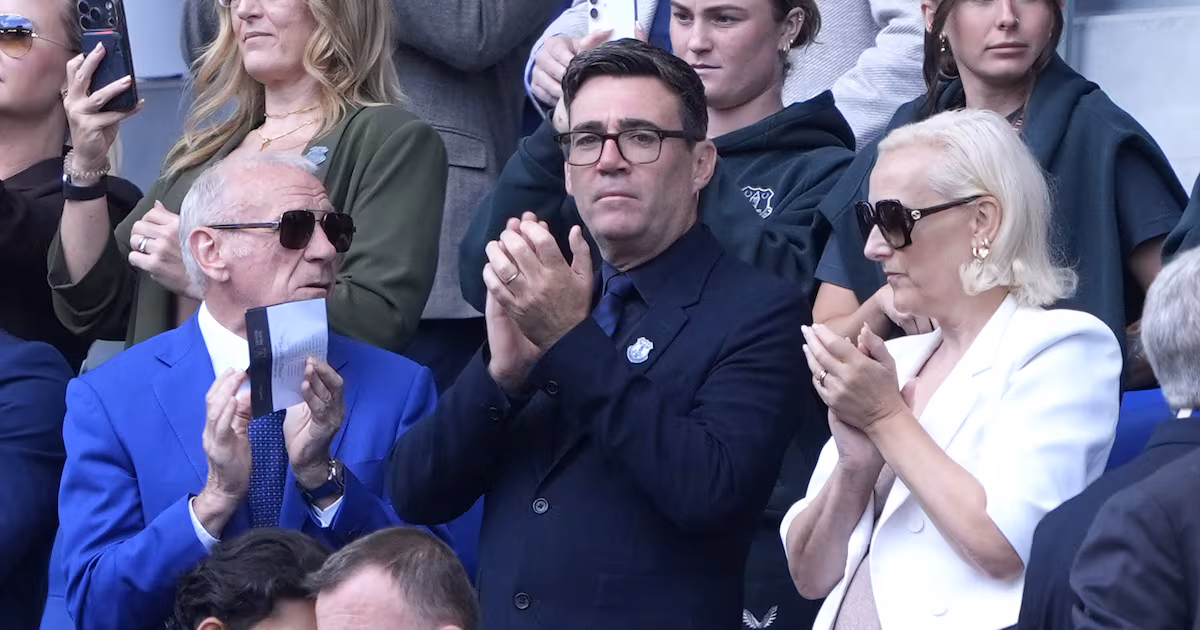 Andy Burnham watches Everton from directors' box