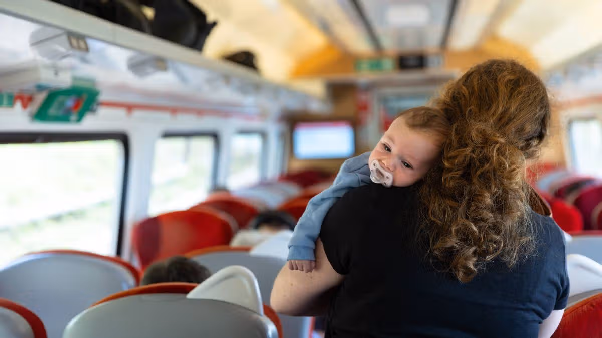 Mum Wakes Sleeping Passenger on Train