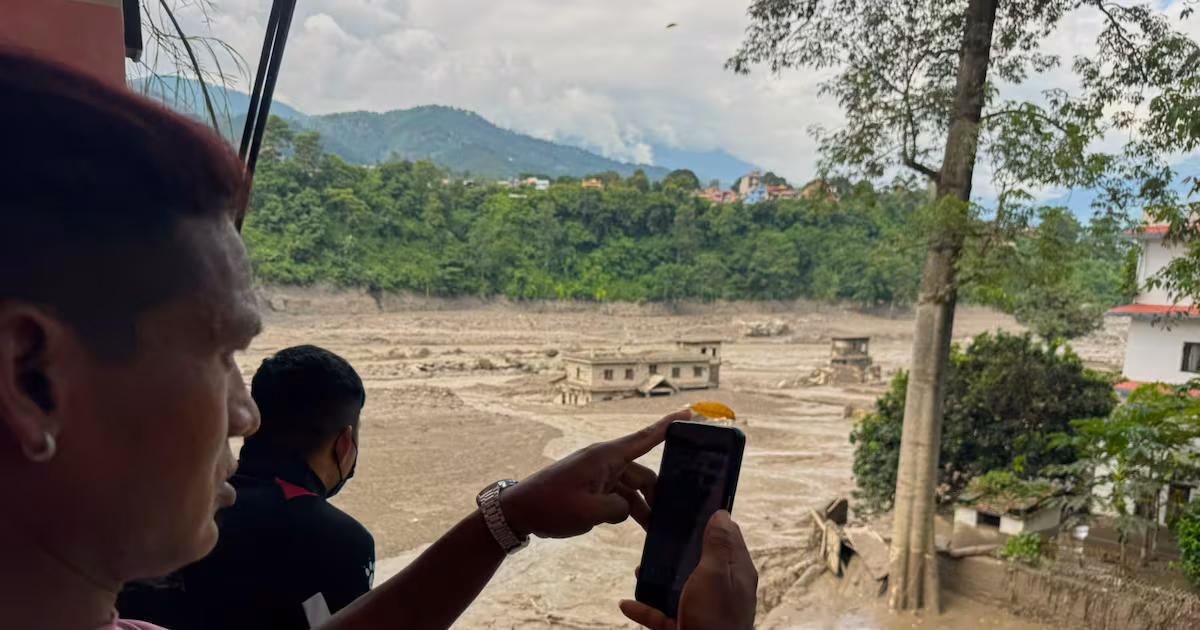 Flash floods in Nepal kill 22, hundreds missing