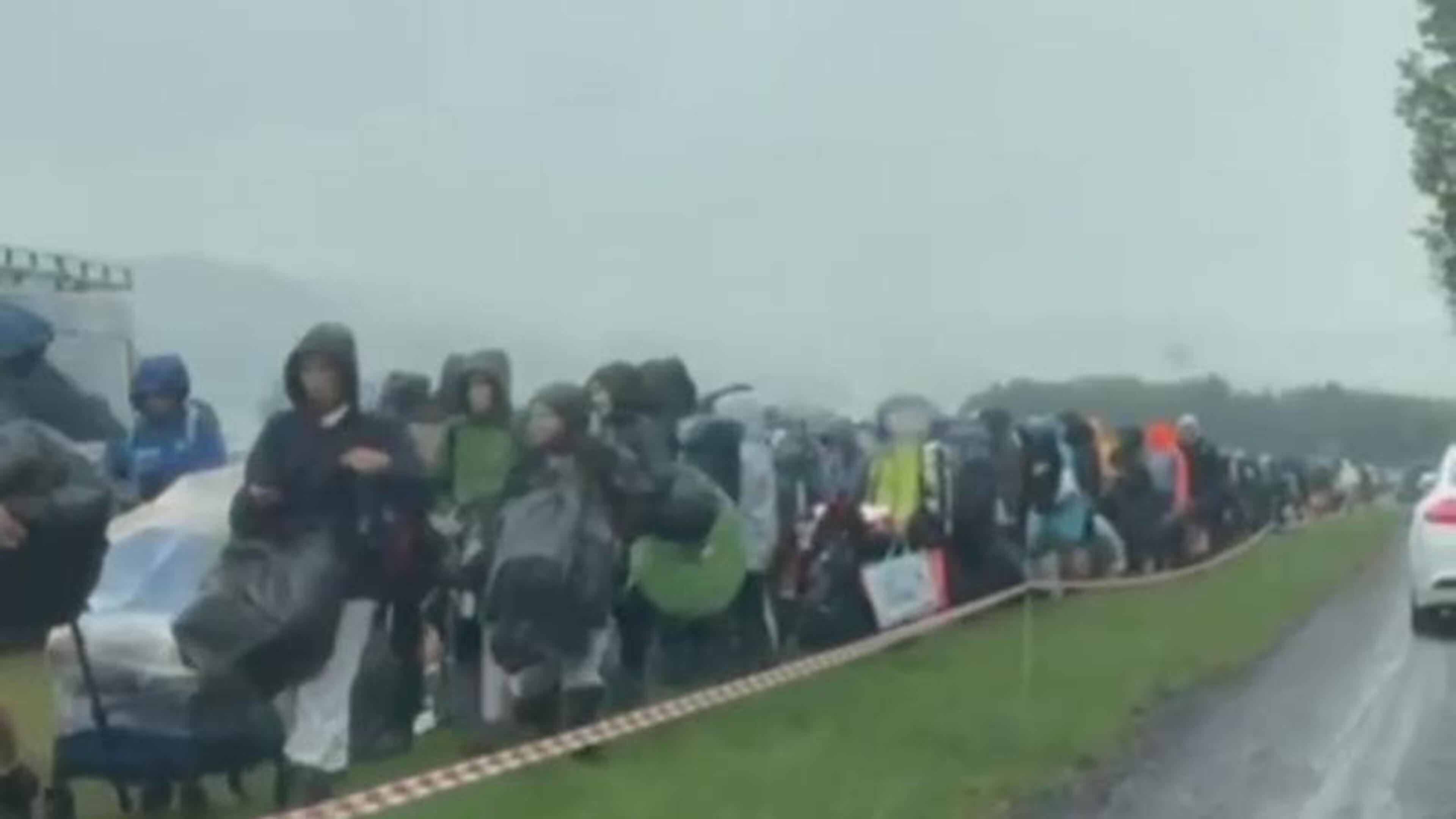 Campers Queue in Rain for Electric Picnic Access