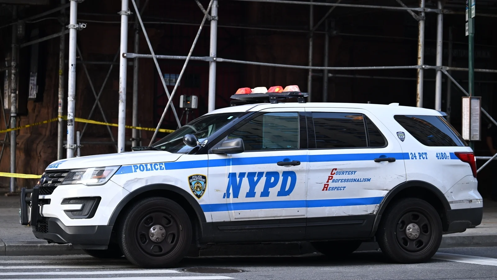 Woman shot by police after stabbing in NY