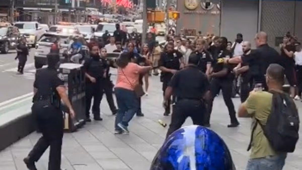 Woman shot by police in Times Square