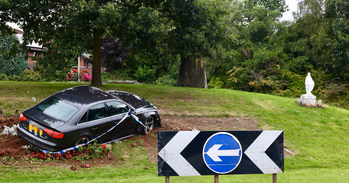 Man charged after car mounts Belfast roundabout