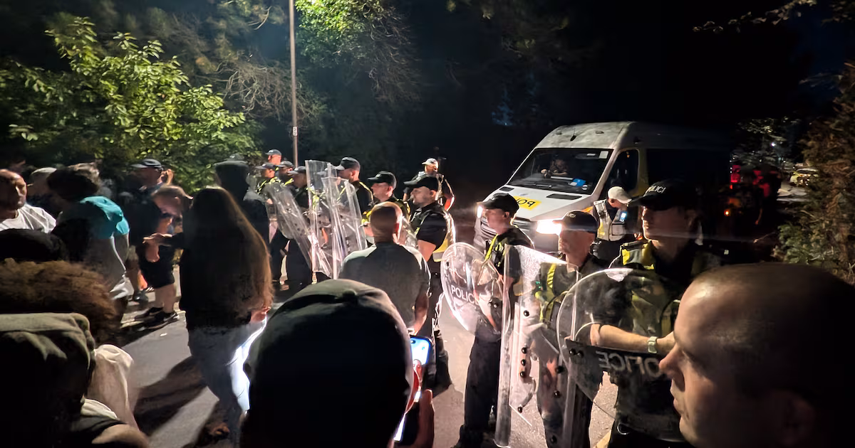 Protesters Clash with Police Over Migrant Arrival