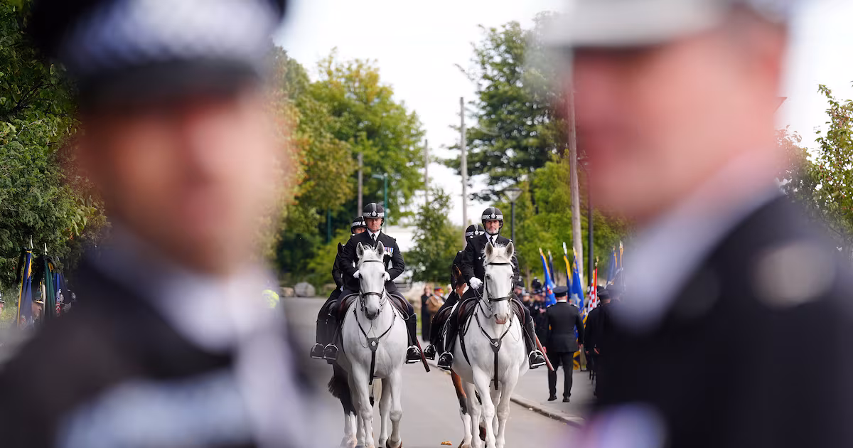 Police and Army Veterans Attend Officer's Funeral