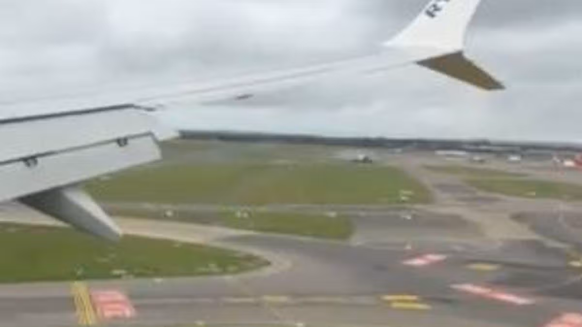 Ryanair flight's wing tip strike captured on video